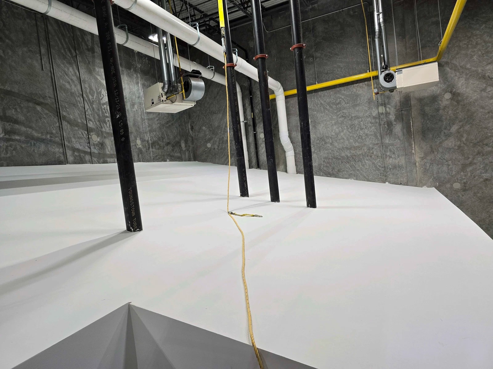 Completed wall partitions and base primer coatings